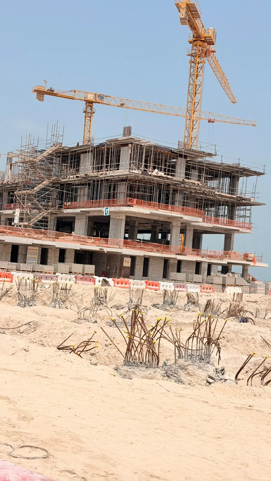 Client-supplied construction photograph accompanying Apartment Construction